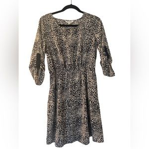 Charming Charlie leopard print dress with 3/4 length sleeve.  Size:M